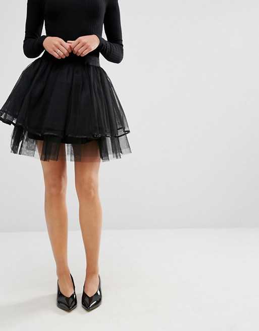 Длинная черная юбка: ваша загадочность станет заметнее